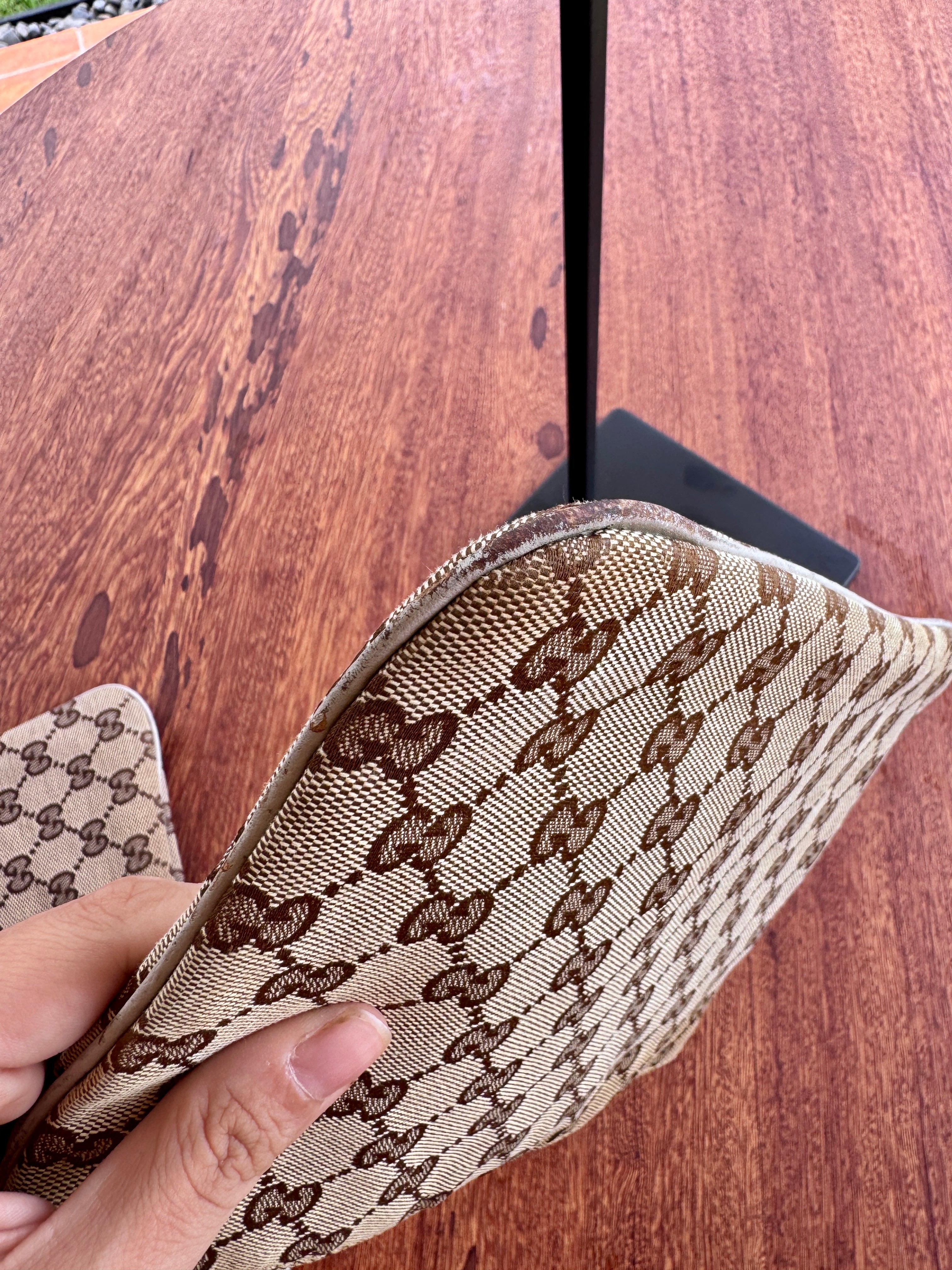 2- Gucci Upcycling Pouch