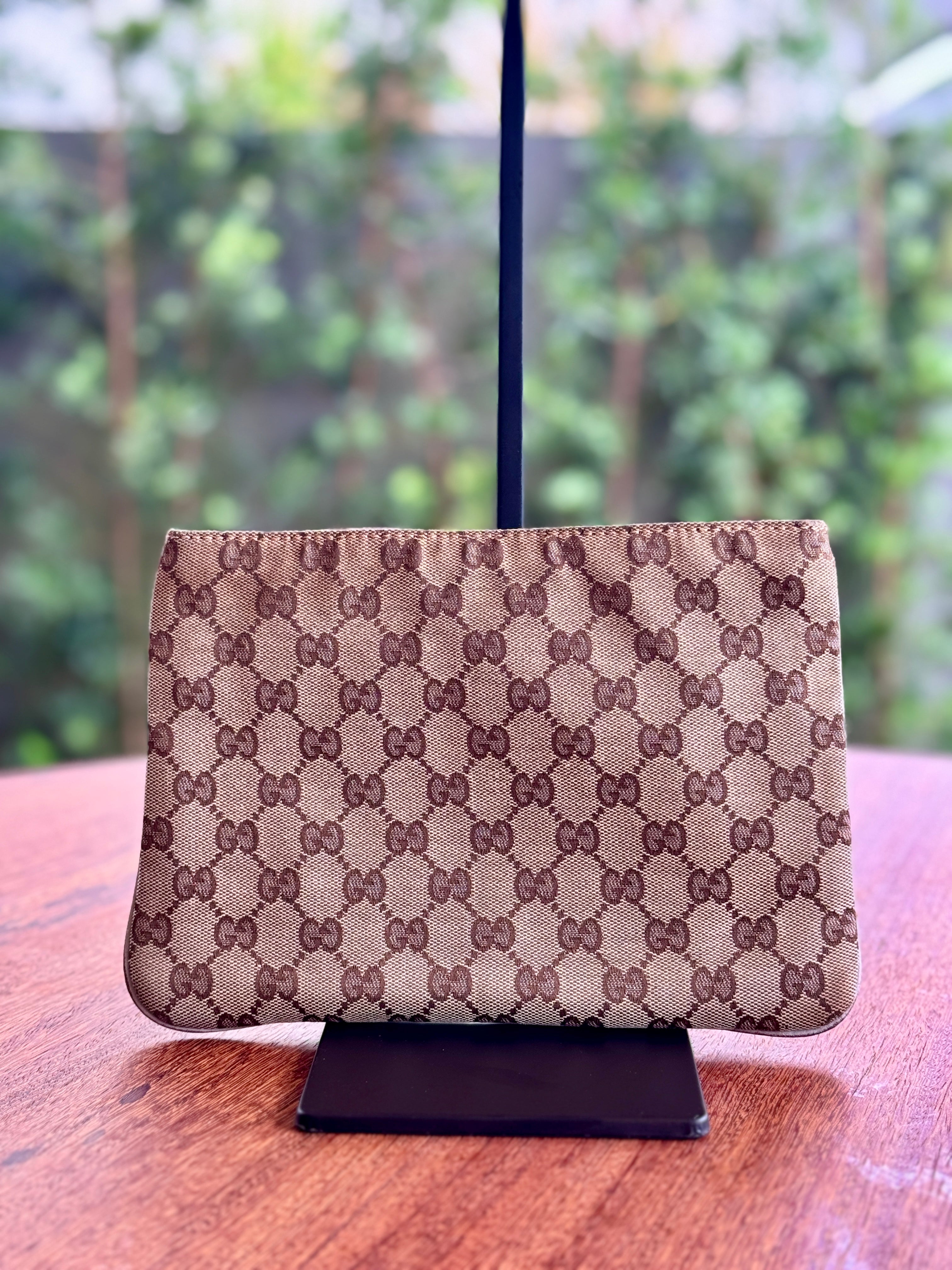 2- Gucci Upcycling Pouch